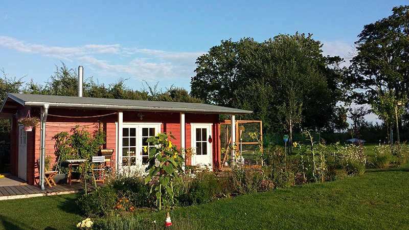 Gartenhaus mit integriertem Abstellraum und Vogelgehege